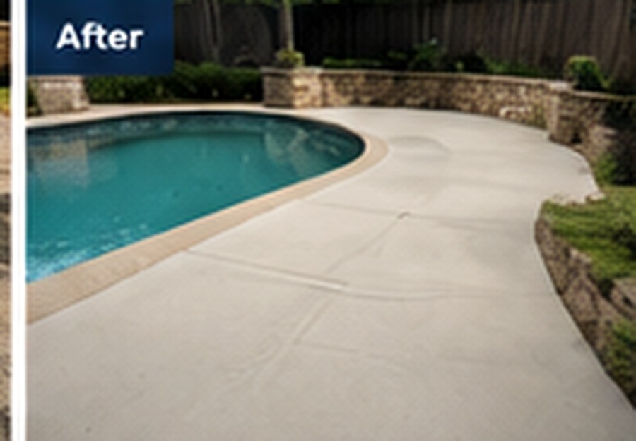 Bright resurfaced concrete pool deck after renovation